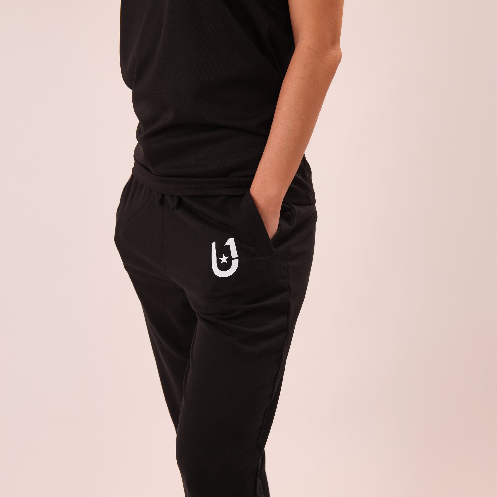 Cozy UNIFY lounge joggers for women, styled for both comfort and casual elegance.