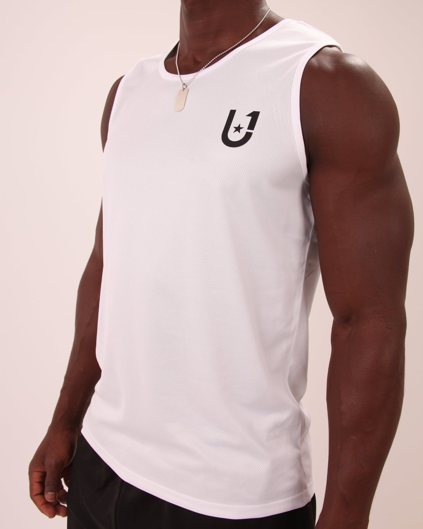 "Stylish and functional white active vest for men, part of the UNIFY sportswear collection, suitable for various fitness activities."