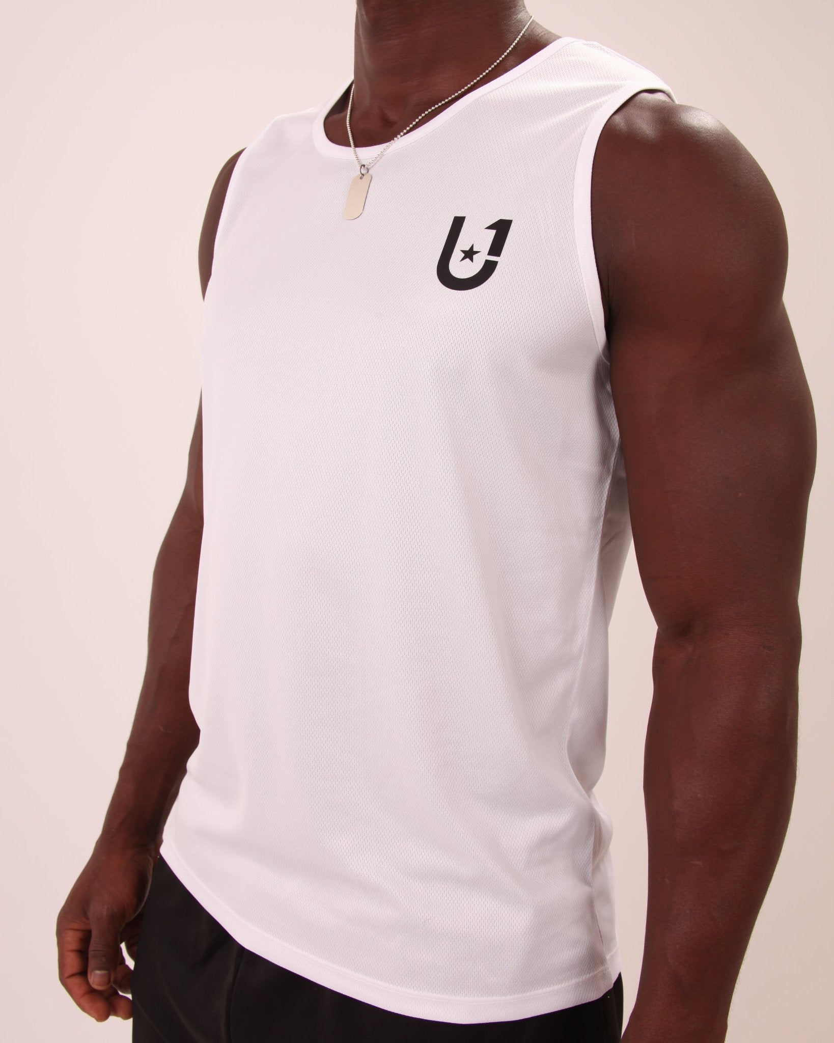 "Stylish and functional white active vest for men, part of the UNIFY sportswear collection, suitable for various fitness activities."