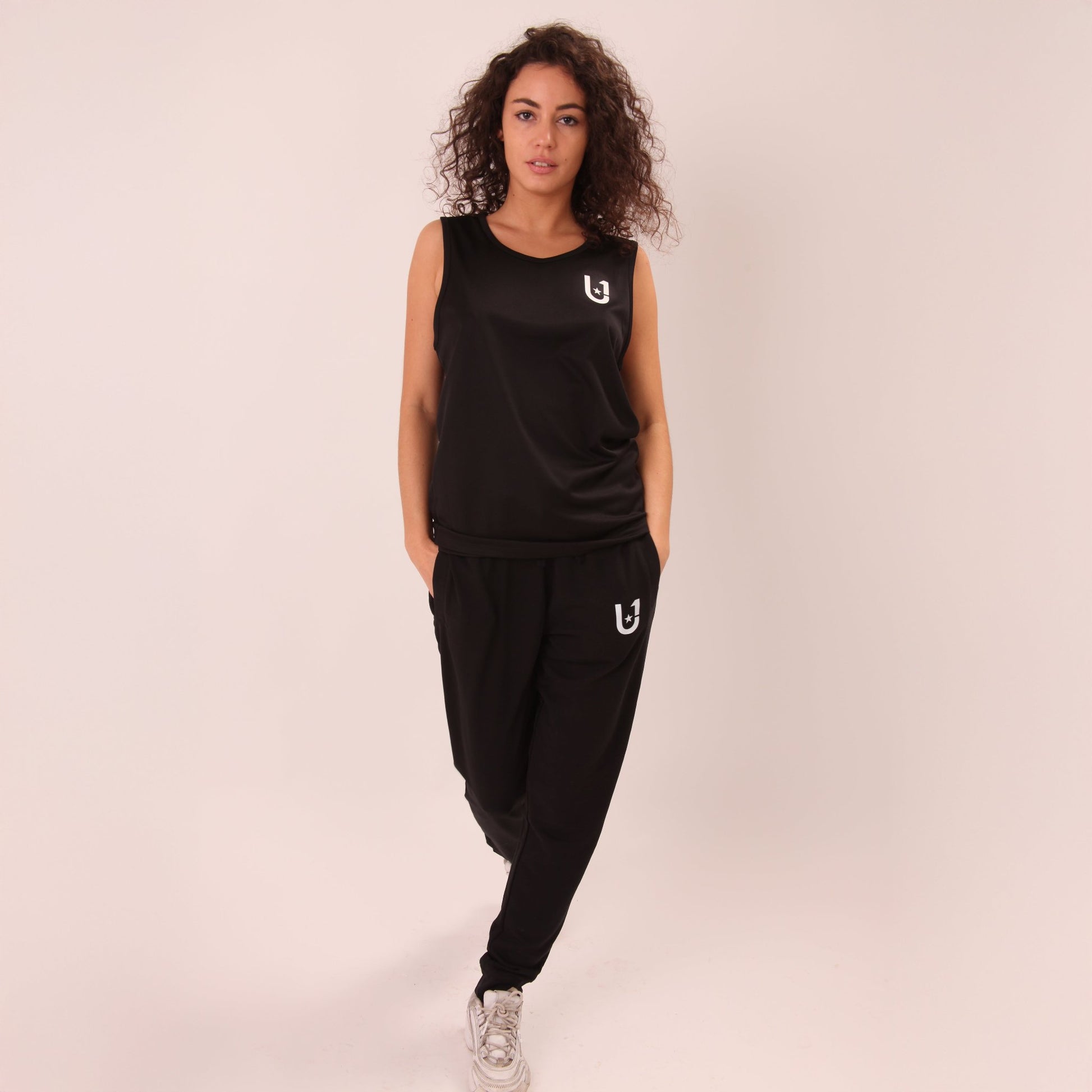 UNIFY women's joggers in slim fit design, perfect for casual wear or gym sessions.