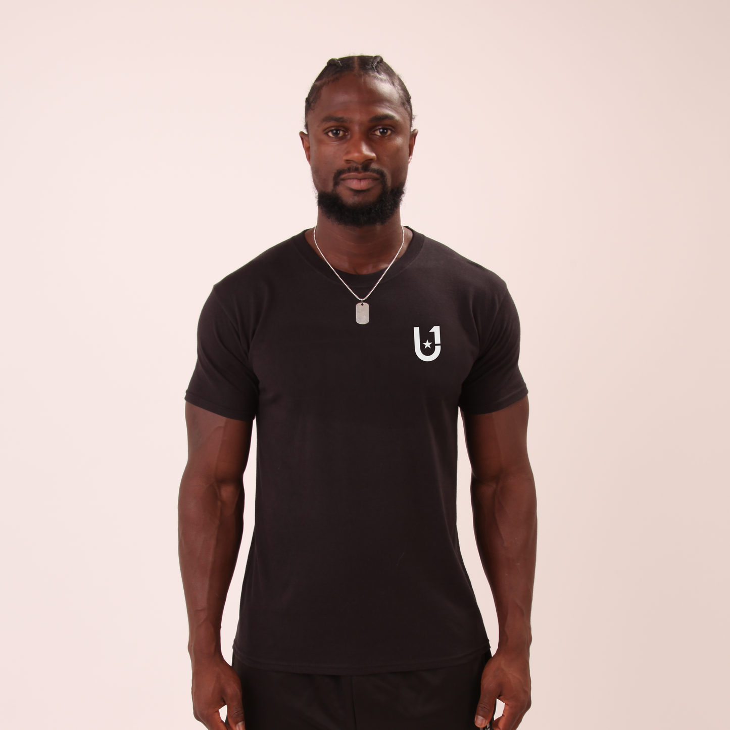 front view of UNIFY men's black tee, styled for casual everyday wear