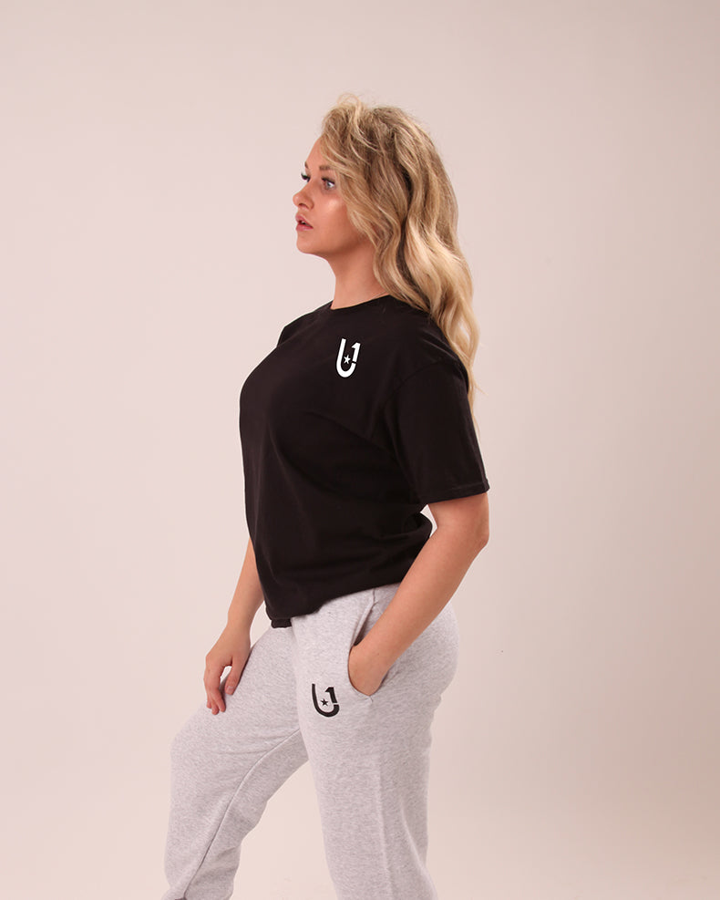 UNIFY black tee styled for women in streetwear look