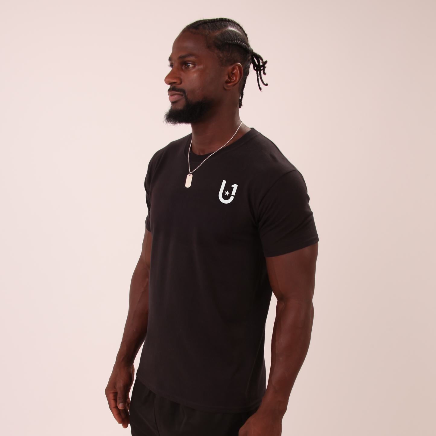 close-up of UNIFY black t-shirt showing smooth fabric and tailored fit