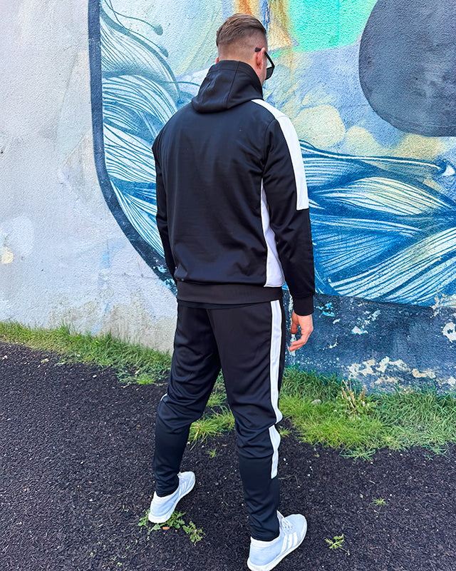 Close-up of waistband and fit on UNIFY crossover track pants