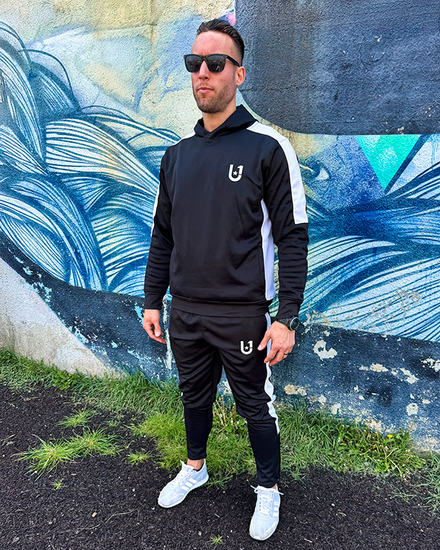 Full body outfit featuring UNIFY men's crossover tracksuit in black and white