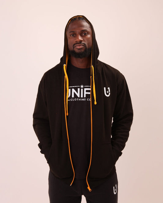 UNIFY men's black and yellow zippered hoodie featuring a vibrant contrast design, perfect for a stylish, sporty look.