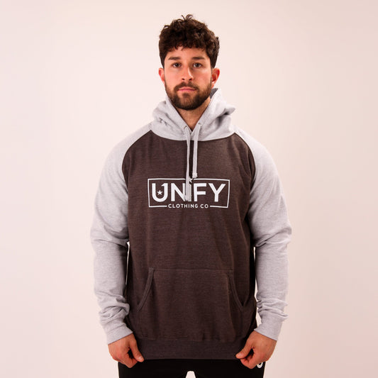 "UNIFY Men's essential grey hoodie, perfect for a refined yet casual style."