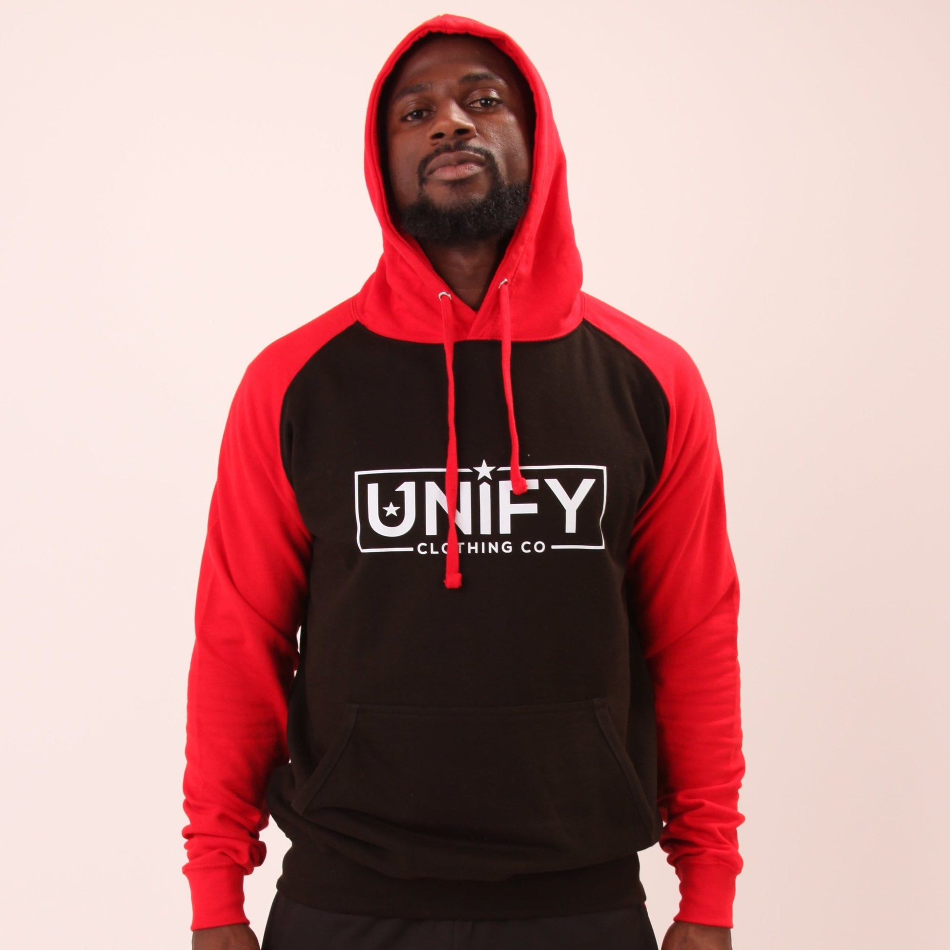 "UNIFY Men's Red/Black Essential Hoodie, perfect for a modern, active lifestyle with a fleece-lined interior for comfort."
