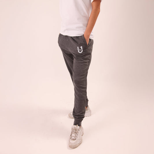 UNIFY women's grey joggers, perfect for a chic, comfortable look suitable for any activity.