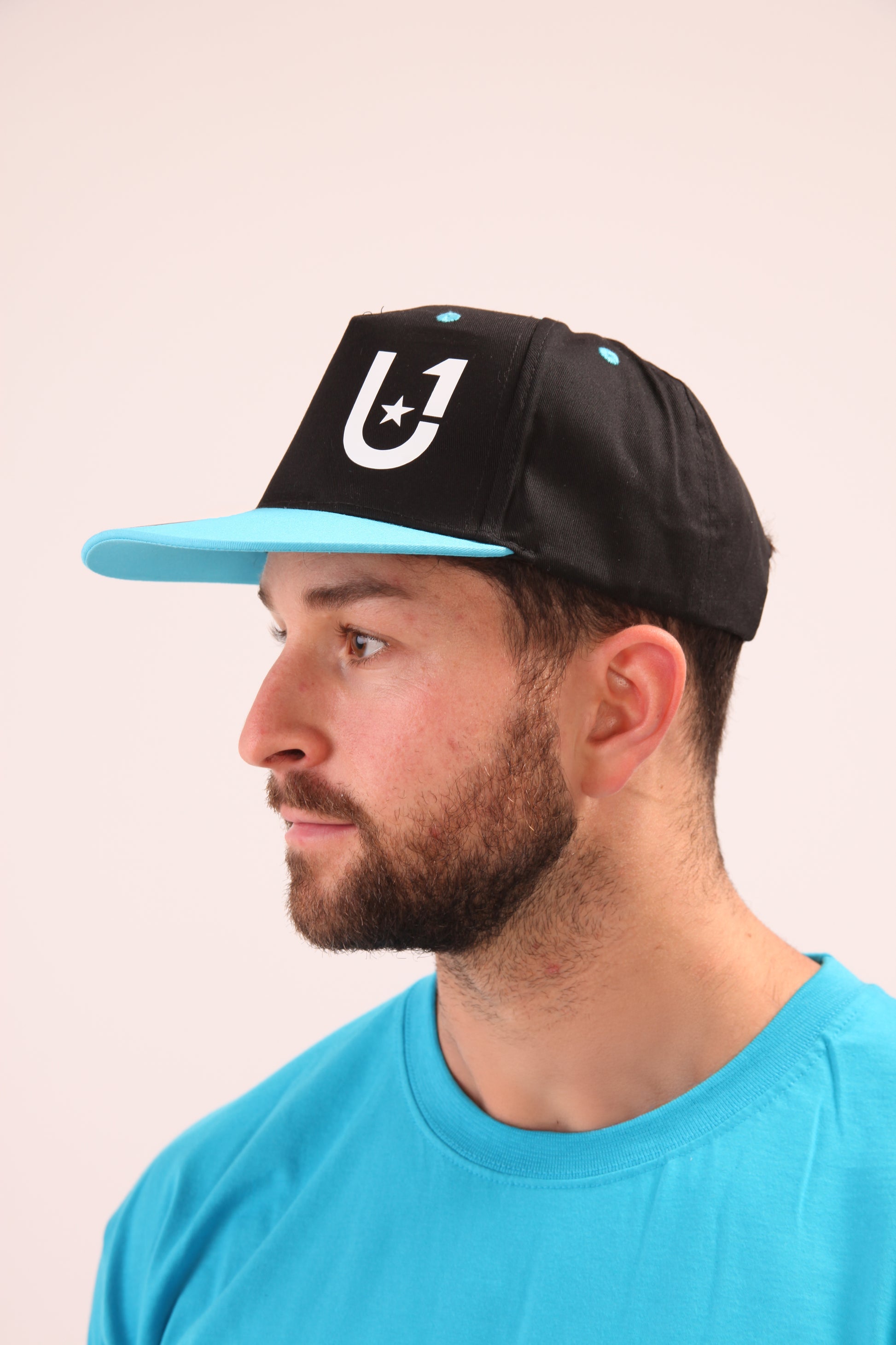 UNIFY U1 performance cap in vibrant blue, designed for durability and comfort during outdoor activities.