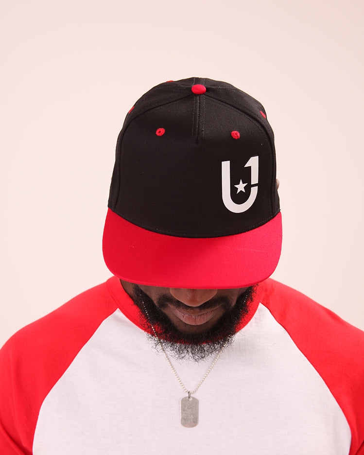Close-up of the U1 Men's Baseball Cap by UNIFY, snapback and iconic branding.