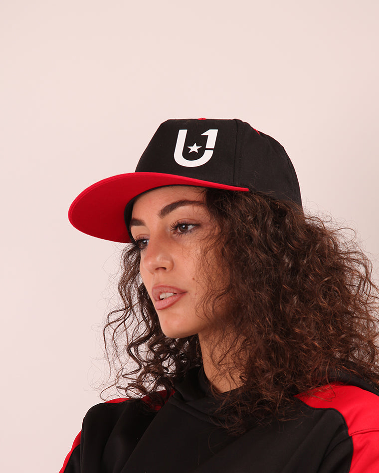 UNIFY U1 women's baseball cap, featuring a sleek design with adjustable snapback for a perfect fit.