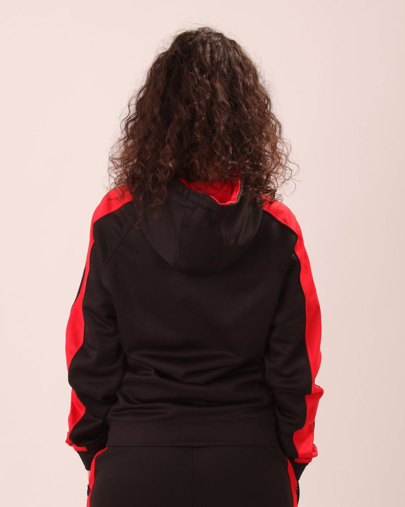 UNIFY's red and black zip hoodie on display, blending fashion with functionality for active wear.
