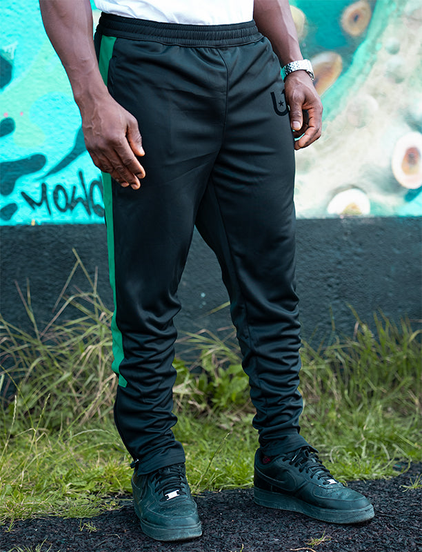 Men’s stylish track pants featuring bold green contrast