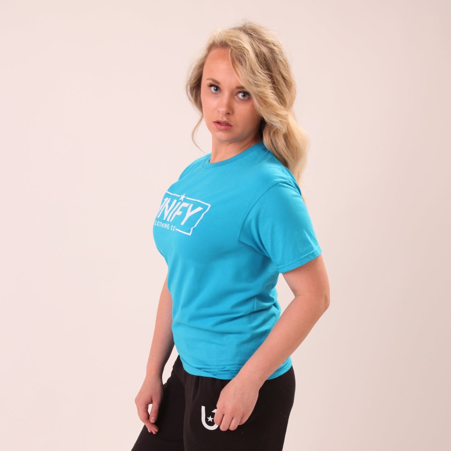 "Elegant blue tee for women, featuring a soft fabric for versatile styling options."
