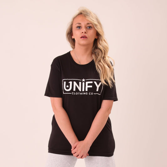"Woman wearing UNIFY's soft black t-shirt, perfect for casual or layered outfits."

