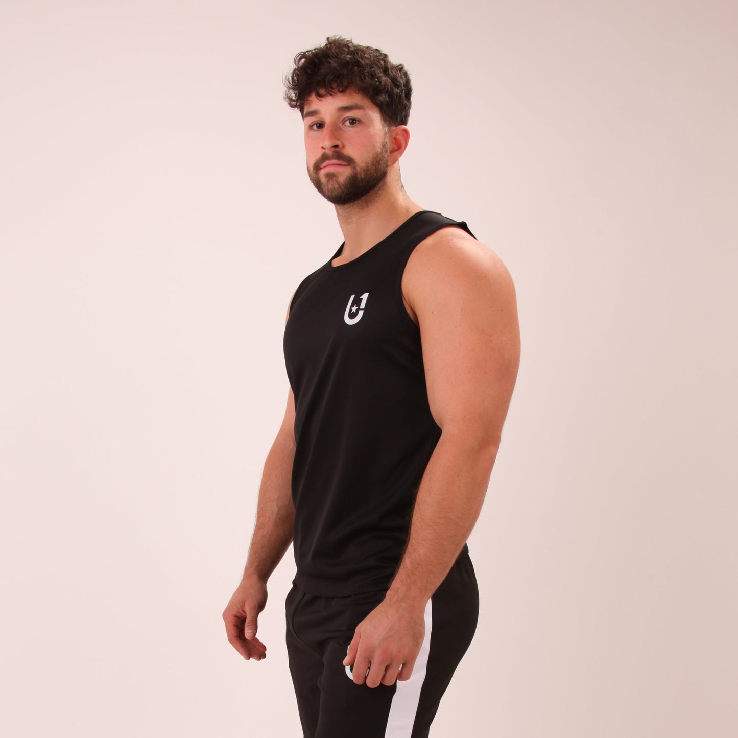 "Close-up of UNIFY Men's Athletic Vest, showcasing the lightweight fabric and moisture-wicking capabilities."
