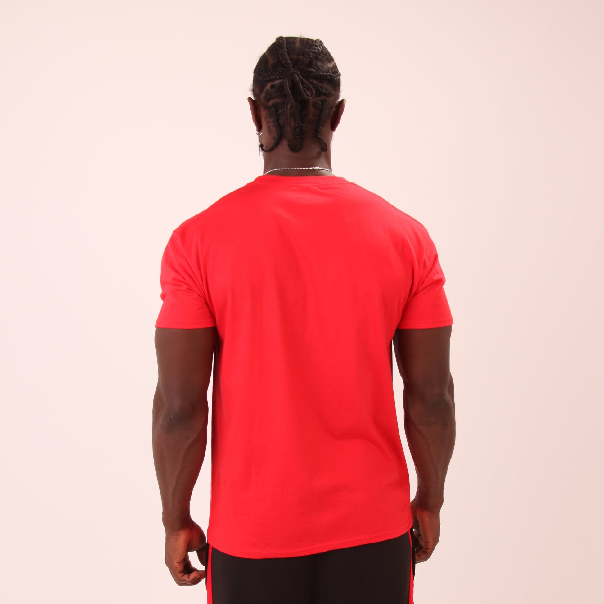 Close-up of UNIFY's vibrant men's red t-shirt, highlighting the quality fabric and sleek design.
