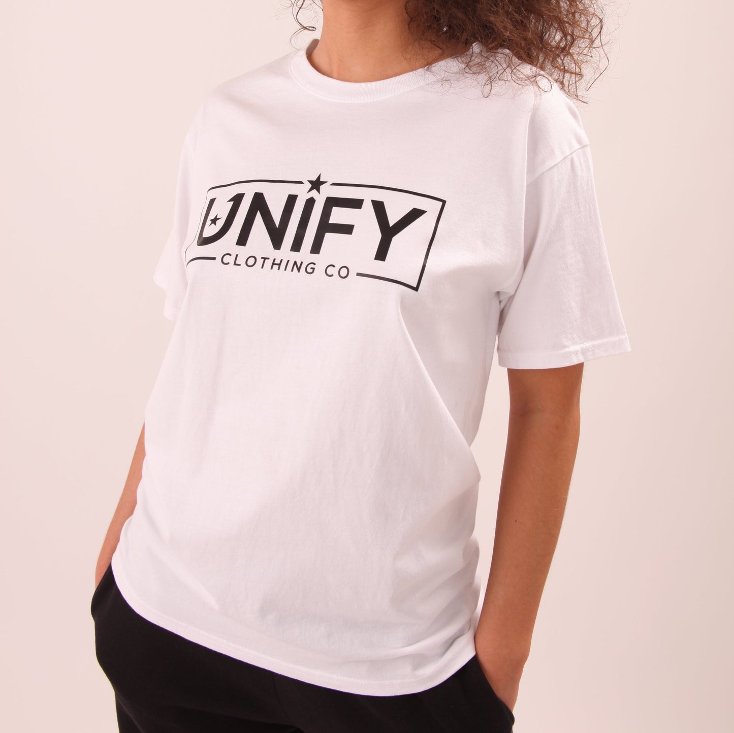 "Close-up of a chic women's white tee, highlighting the soft texture and pristine colour."
