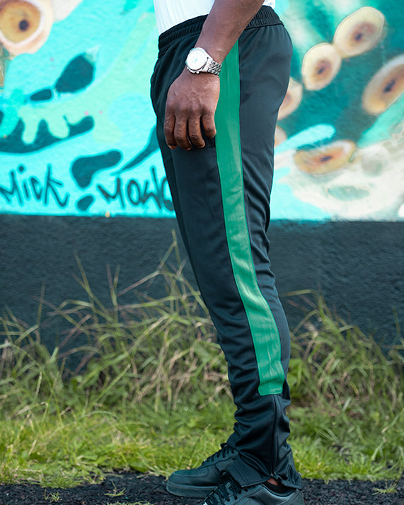Stylish track pants with green side stripes by UNIFY