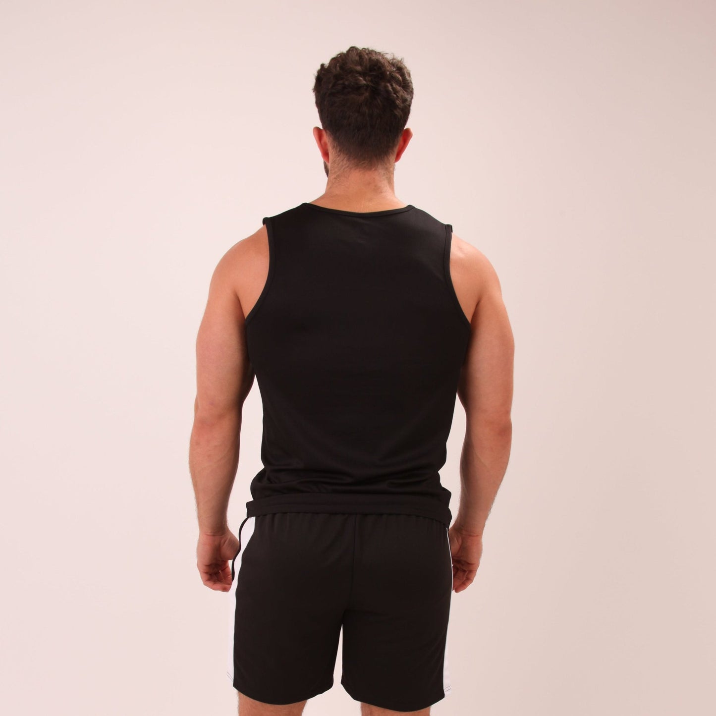 "Stylish UNIFY Men's Sport Vest featured in action, perfect for gym enthusiasts and casual wear."
