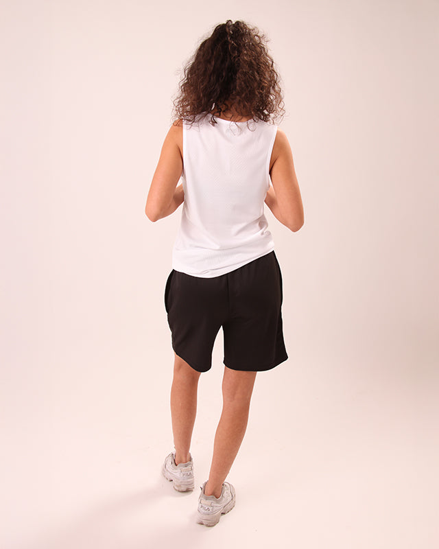 UNIFY women’s black shorts worn in an active streetwear look
