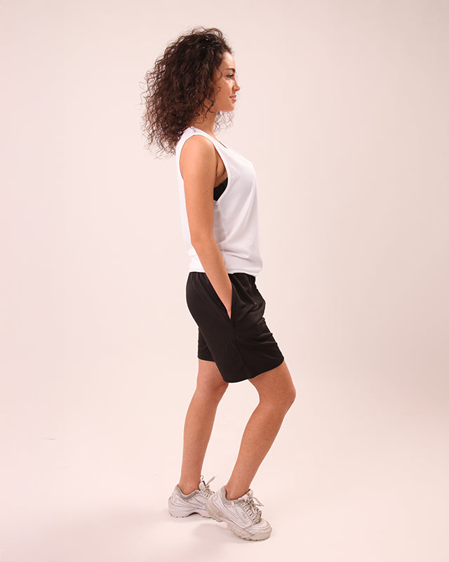 Close-up of waistband on UNIFY black shorts for women