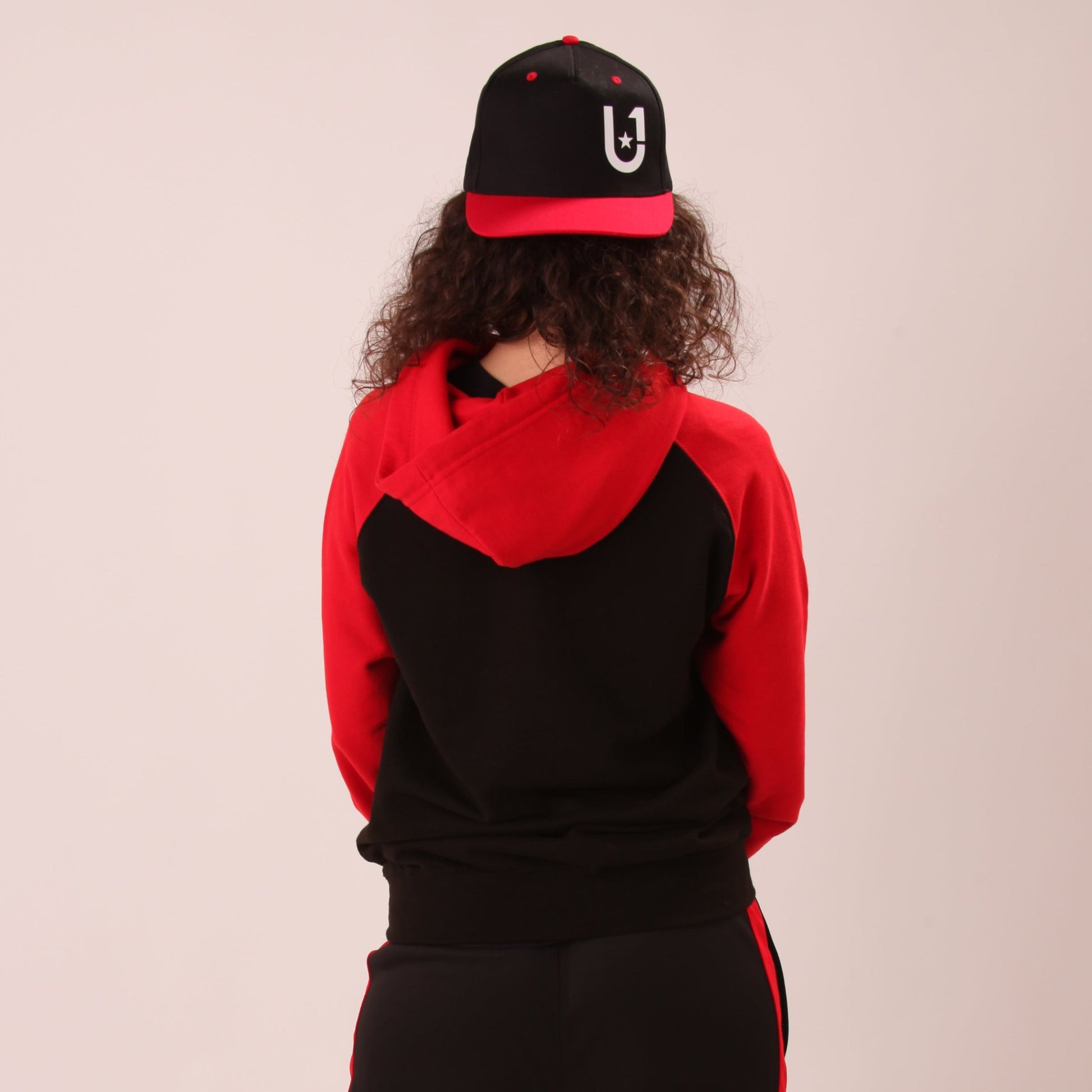 "Elegant and simple UNIFY essential hoodie for women displayed on a mannequin, emphasizing comfort and style."
