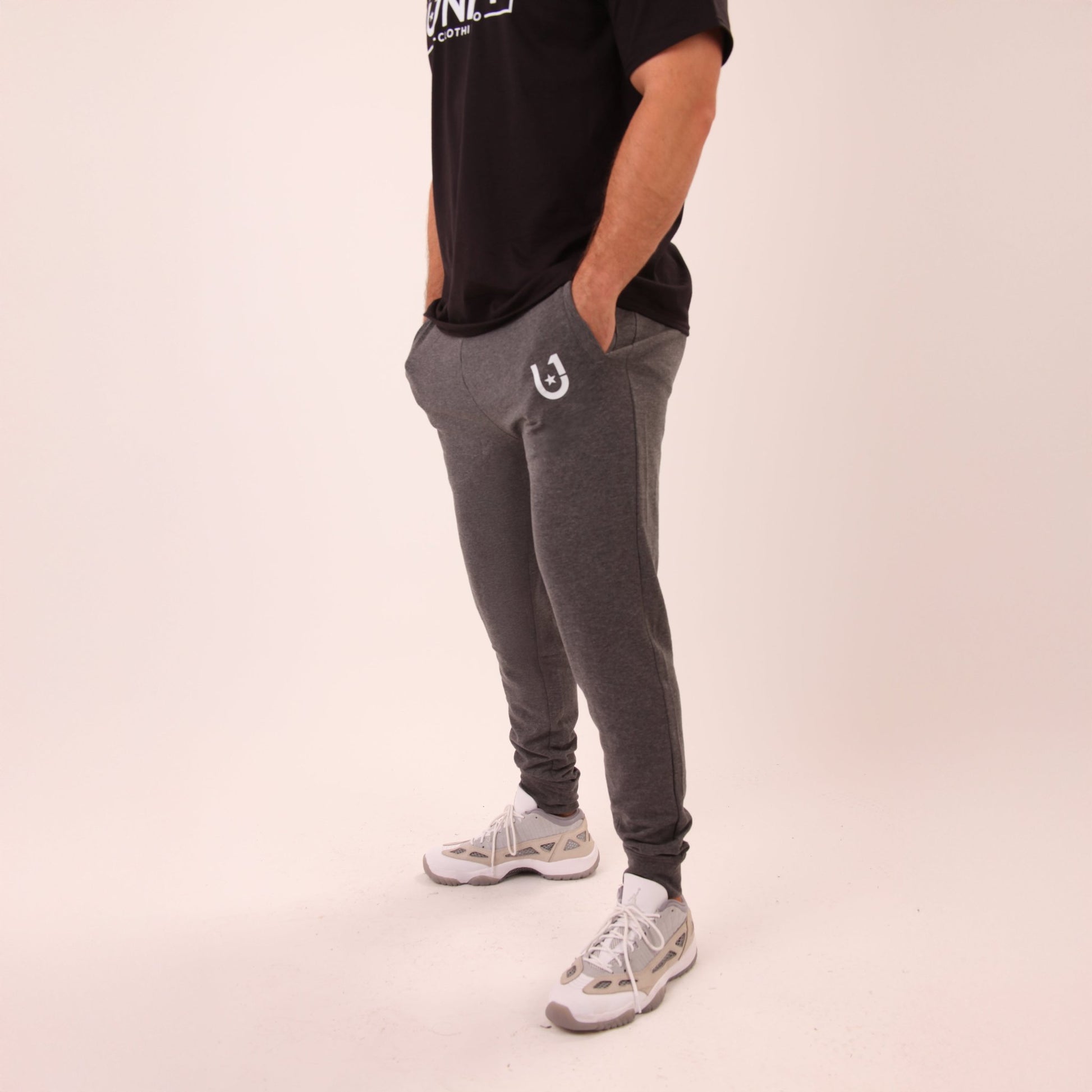 UNIFY men's grey joggers, designed for superior comfort and effortless style.
