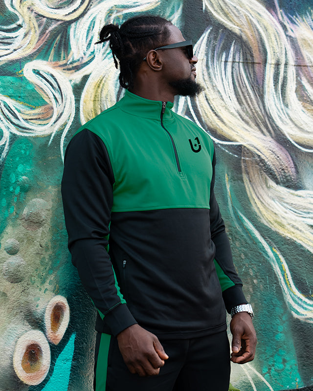 Back design details of green and black track top by UNIFY