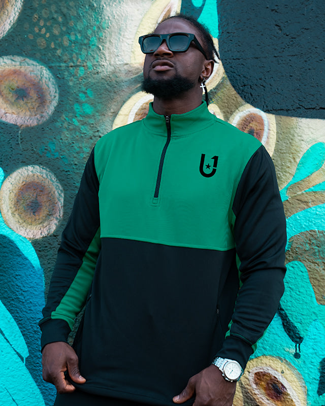 Styled outfit featuring UNIFY Motion Line green and black track top