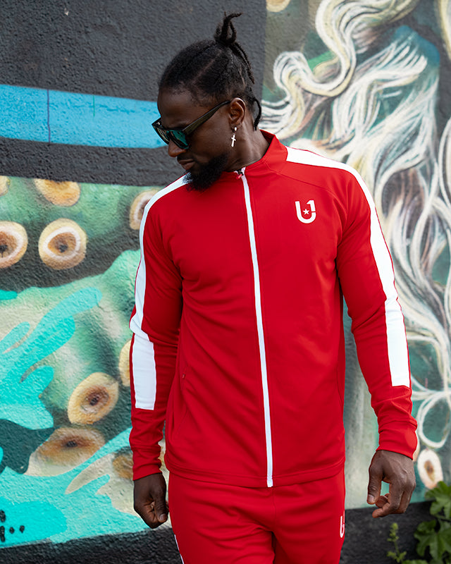 Full outfit styled with UNIFY red and white track top for streetwear look