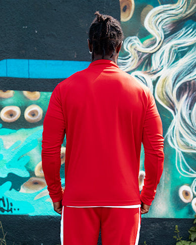 back view of the crossover red and white track top
