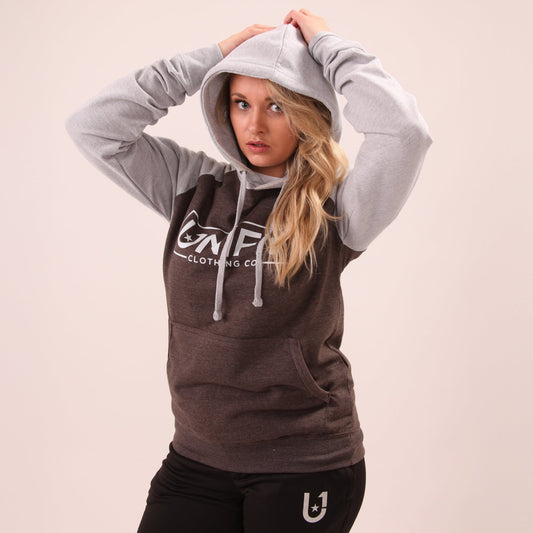 "UNIFY Women's essential grey hoodie, ideal for a sleek, versatile look suitable for any setting."
