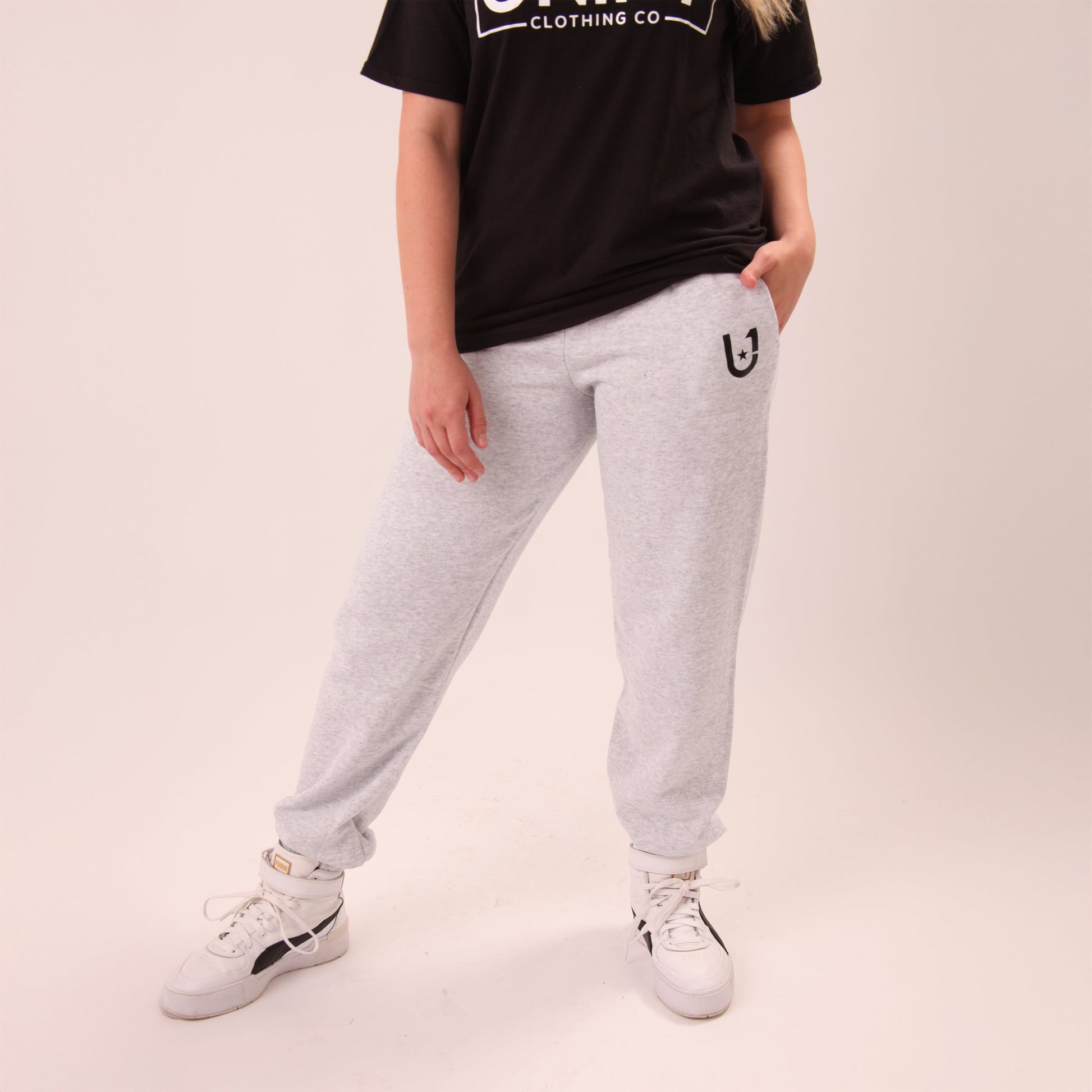 UNIFY women's grey wide-leg joggers, combining style with comfort for a relaxed fit.
