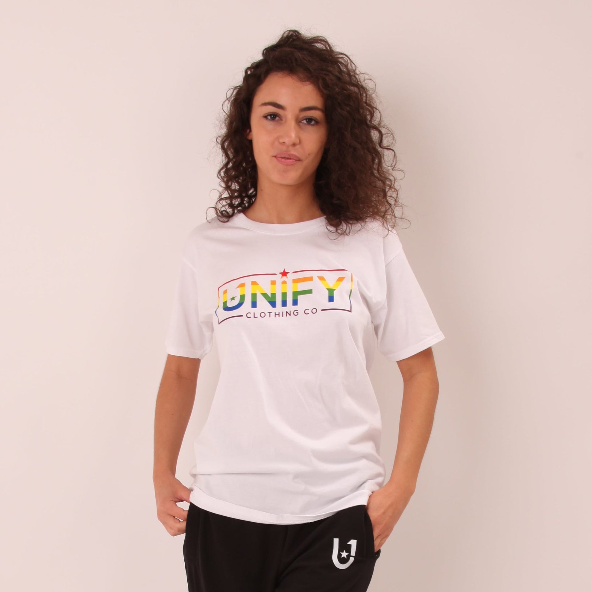 "UNIFY Women's Rainbow Pride T-shirt, featuring a colourful design to celebrate diversity and inclusion."
