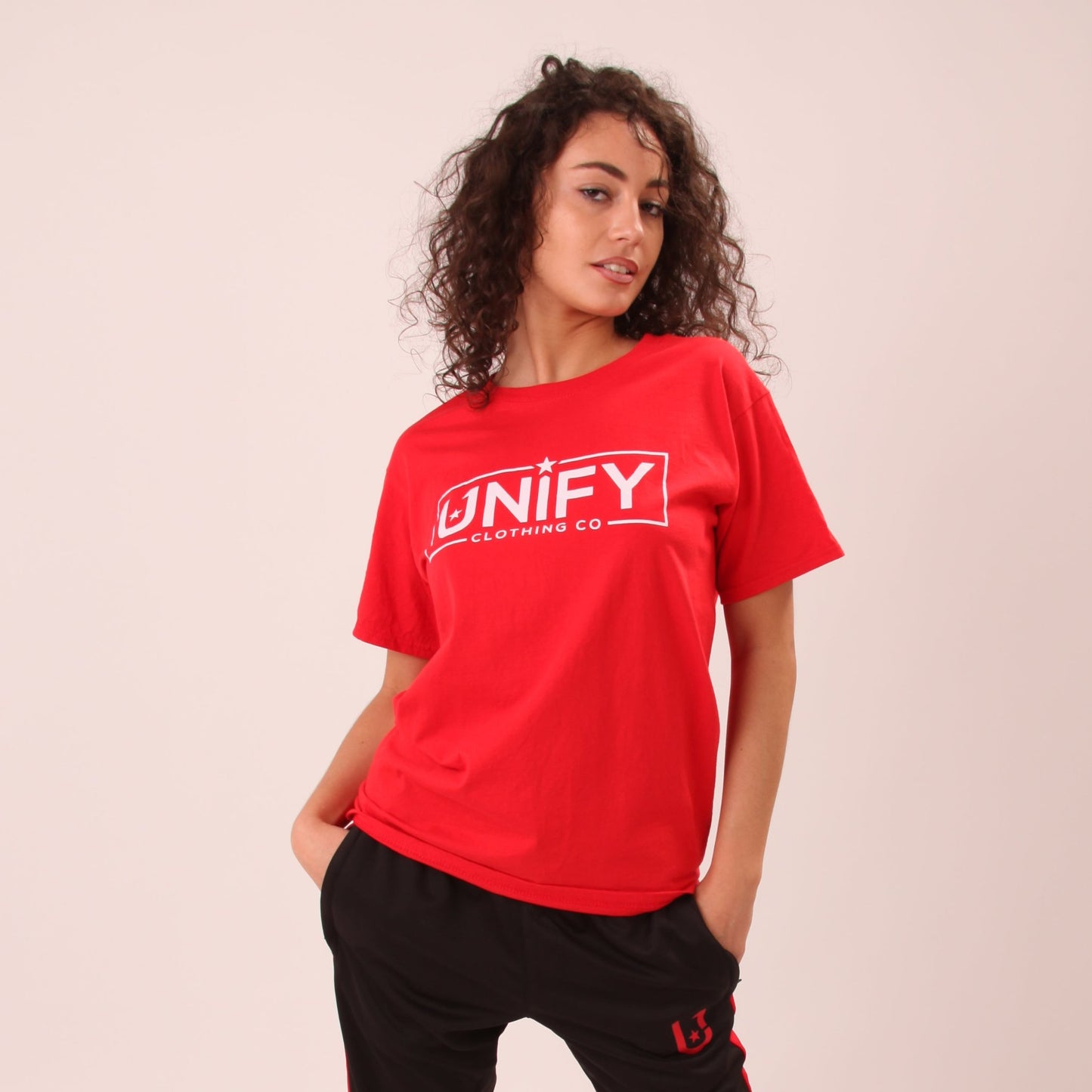"Soft red cotton t-shirt for women, laid out flat to showcase its quality and rich colour."
