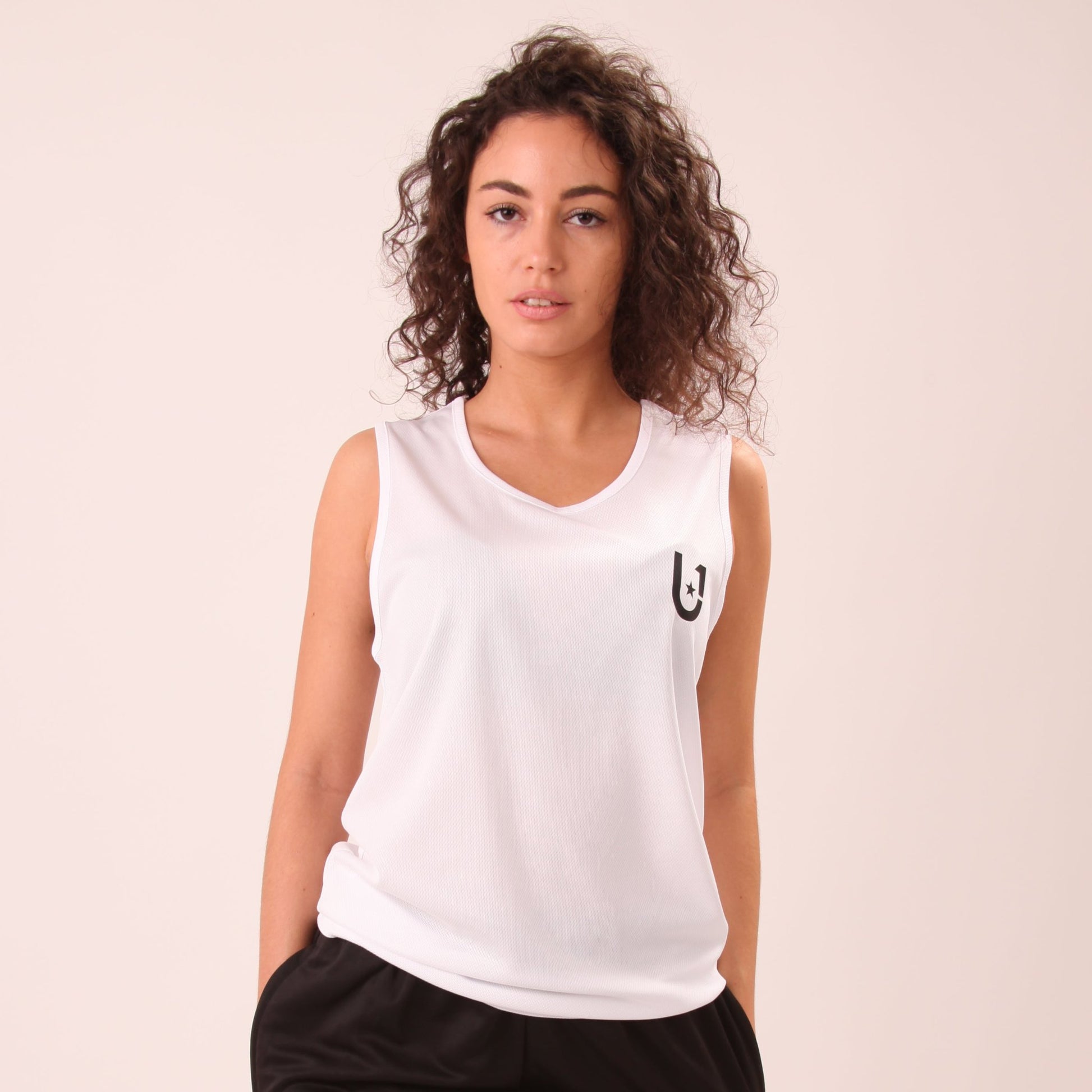 UNIFY Women's White Athletic Ladies Vest Top featuring breathable, lightweight fabric, designed for comfort and style in sports and casual wear.