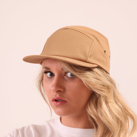 womens beige skater cap is perfect for a good run